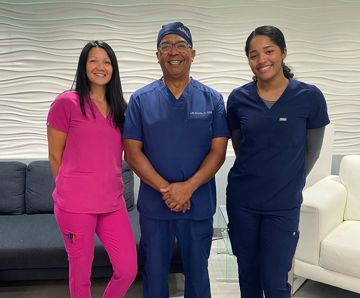 Icon Pediatric Dentistry Doctor with two team members smiling